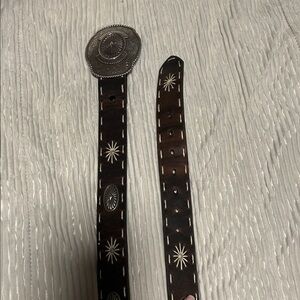 Intricate Brown Leather Belt with Silver Accents
